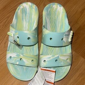 CROCS NWT men’s size 9, women’s 11 marbled Green and Blue Slide Sandals shoes